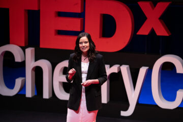 Cristina Escobar on the TEDx stage